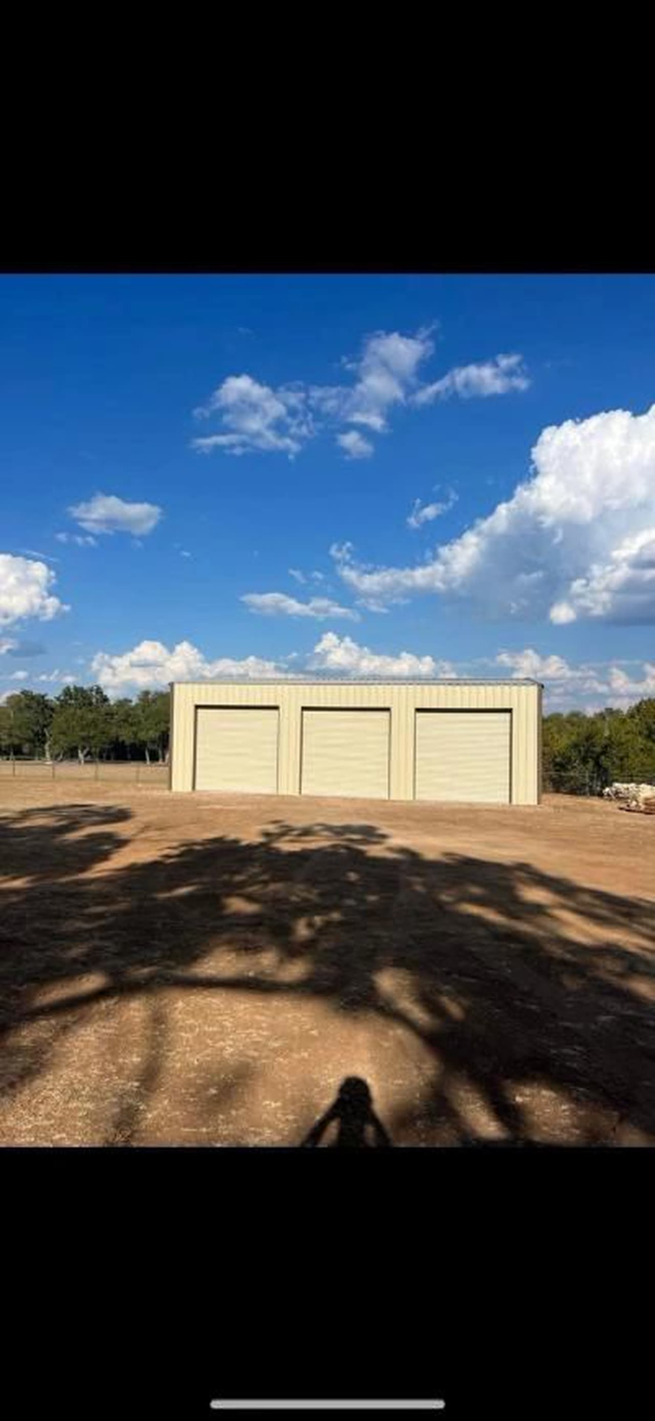Custom three-car garage steel structure