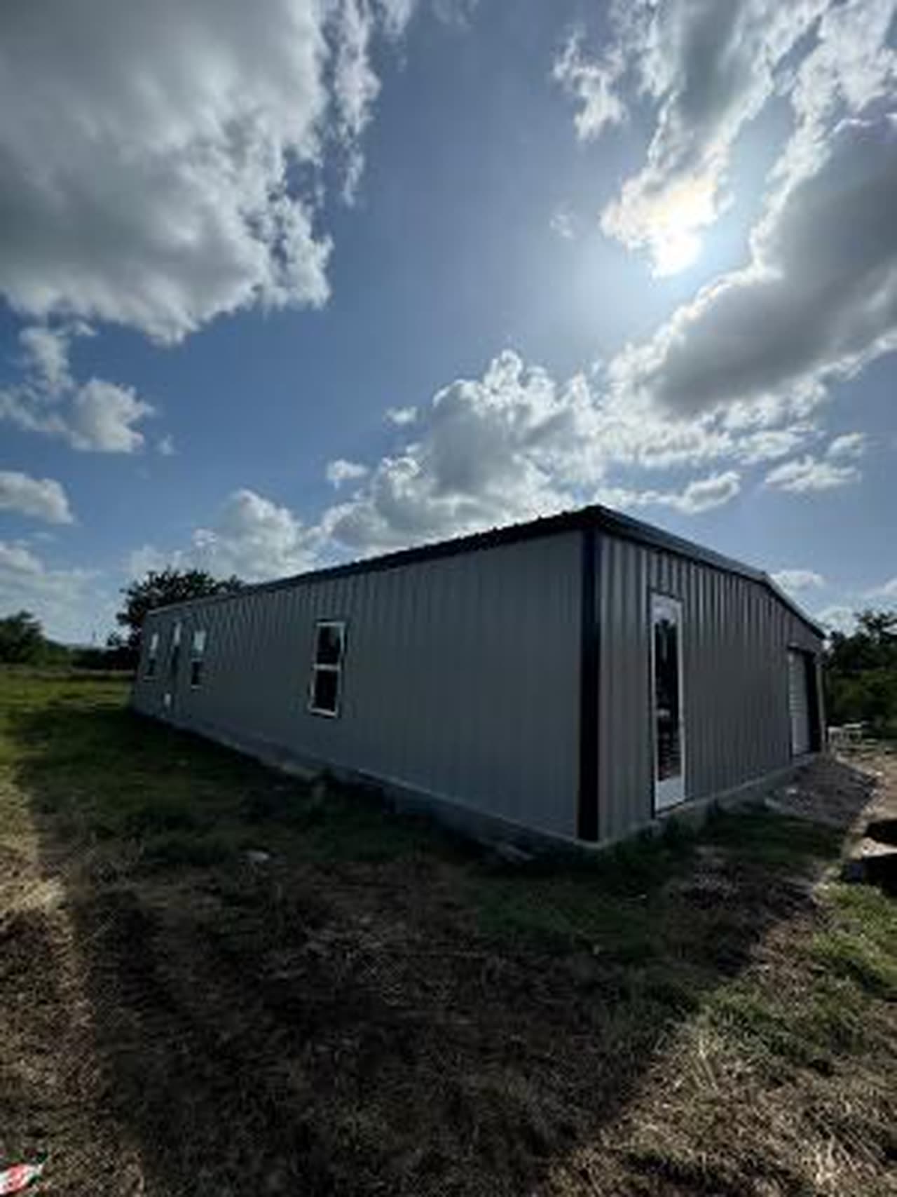 Albert custom home metal building, full structure