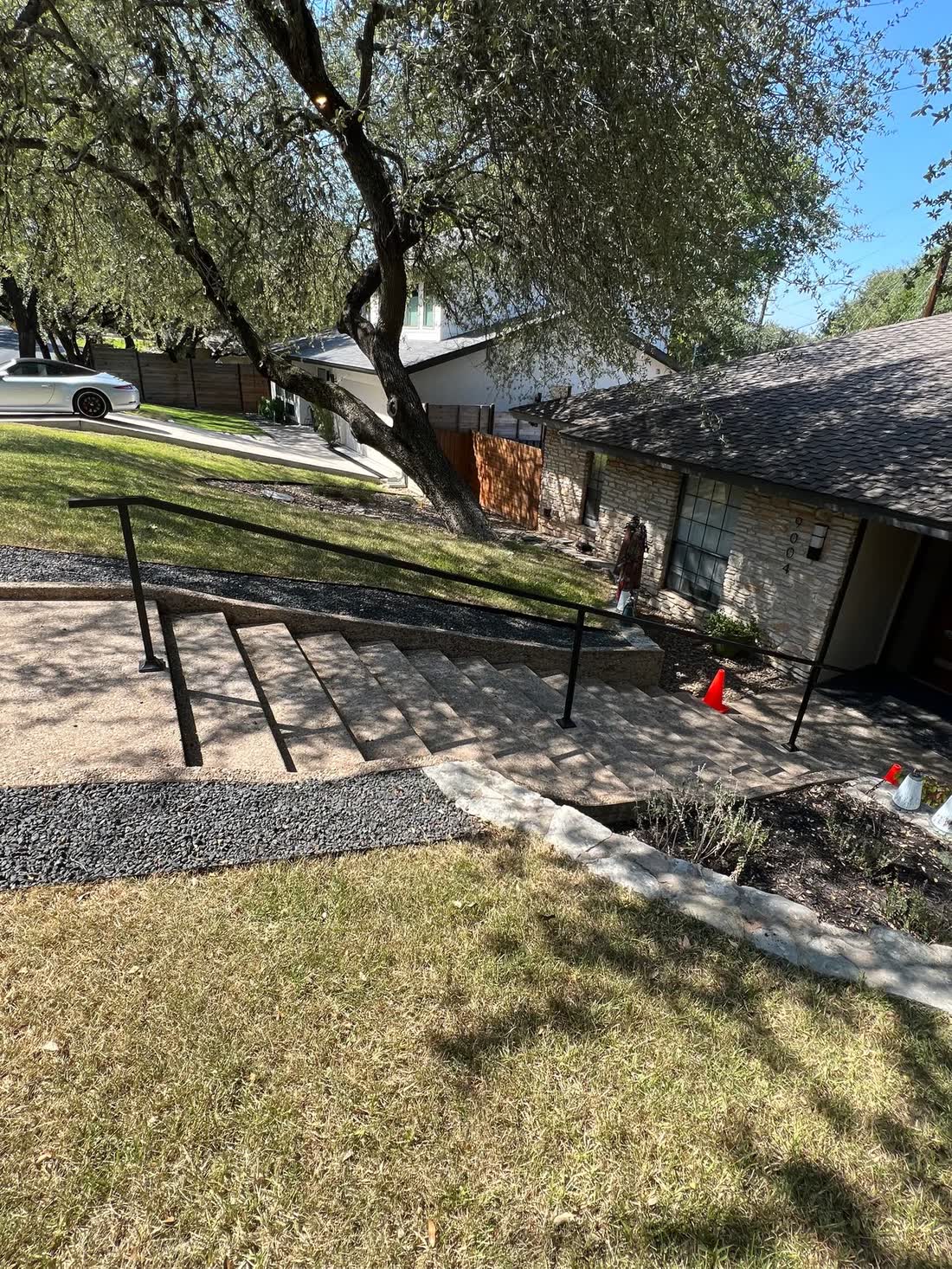 Custom welded steel handrail and stairwell, residential